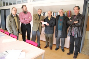 Entrega a Caritas Parroquial del dinero recaudado en la Carrera Solidaria